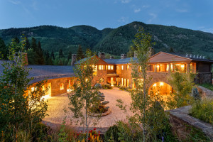 The home was built with natural materials such as stone and Douglas fir wood siding.