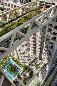 The two lower sky bridges are lined with trees and chairs for residents of the building to enjoy.