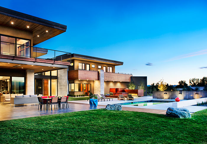 The multi-level roofs are a part of Ojala’s passive solar design. “I designed the roof overhangs calculating the altitude of the sun through the year, so in the autumn equinox the sun will slowly enter the house, warming the space, and in the spring it will slowly leave the house, keeping the home cooler.” The green piece was important to the homeowners . The husband researched solar energy systems and a solar panel system was added to the roof,  making for an electricity bill as enviable as the space. "The home is 120 percent powered by solar," he says. “We’ve never had an electricity bill, and in the summer, our account is negative a few hundred dollars.” 