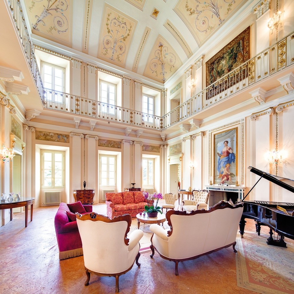 This neoclassical villa was built in the 1700s by Swiss architect Felice Soave and decorated by Giocondo Albertolli, who also did Florence’s Uffizi Gallery. The nine-suite property features a public room with frescoes and carved marble accents and gardens complete with a heated swimming pool. Famous guests include composer Vincenzo Bellini (who wrote his opera Norma here), Winston Churchill, and Napoléon Bonaparte. From $39,354/week; thevillapassalacqua.com